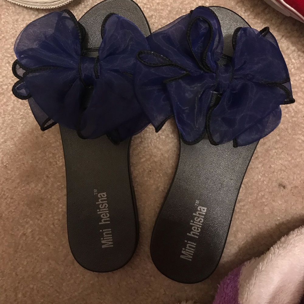 Black and blue bow slides